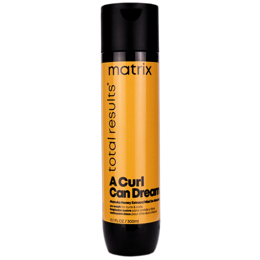 Matrix A Curl Can Dream Co-Wash is for curls and coils and infused with Manuka honey extract. This gentle cleansing conditioner is perfect for in-between wash days to revive curls.