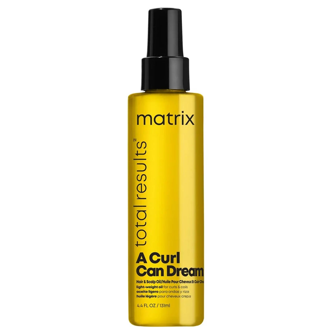 Matrix A Curl Can Dream Oil for your hair and scalp is a nourishing oil specifically designed for curly hair. This lightweight formula helps to define curls while providing essential moisture and shine.