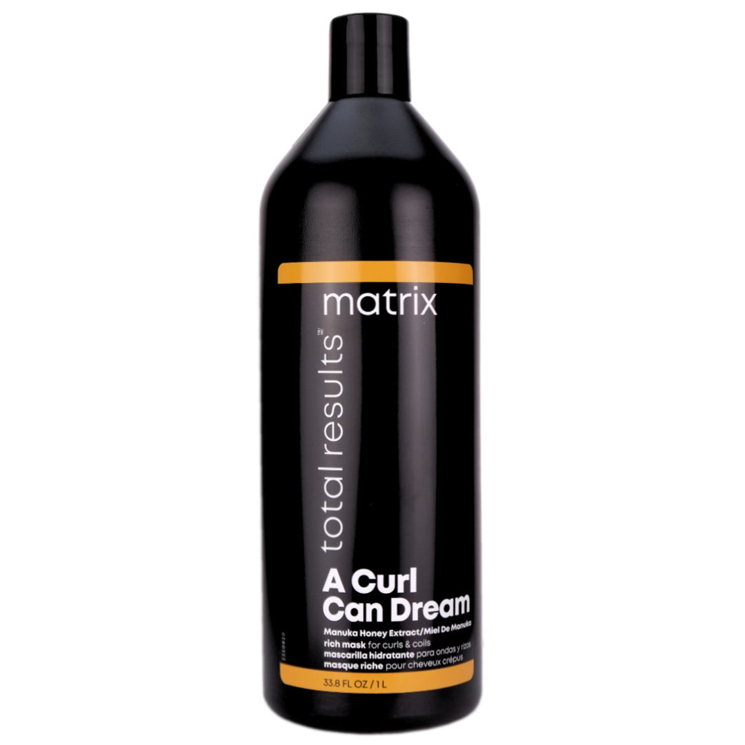 Matrix A Curl Can Dream Rich Mask 1 Litre for curls and coils is infused with Manuka honey extract and provides deep hydration that preserves curls and coils, leaving your hair bouncy, soft and defined.