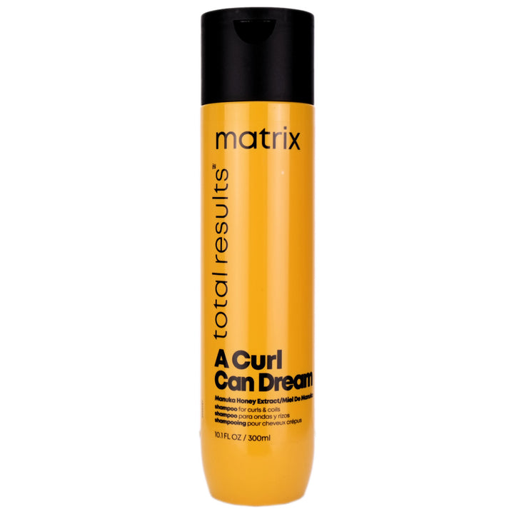 Matrix A Curl Can Dream Shampoo is formulated for curls and coils, infused with Manuka honey extract. This deep cleansing shampoo removes build-up while preserving your pattern, for bouncy, healthy curls that look and feel amazing.