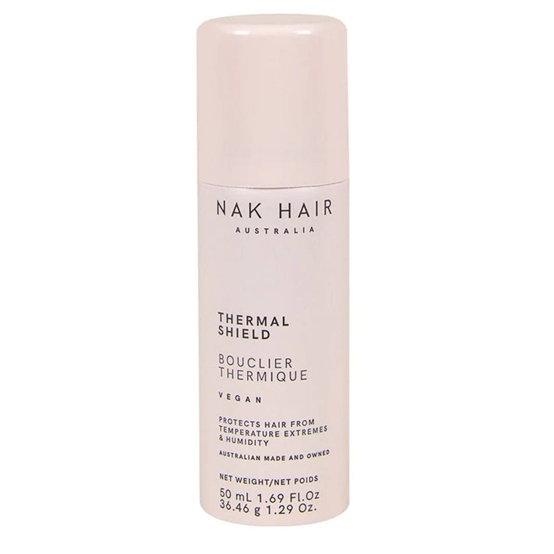 Nak Hair Thermal Shield helps to protect and shield hair from temperature extremes caused by hot tools and humidity and is a perfect 50ml mini size for your handbag.