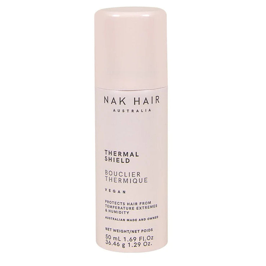 Nak Hair Thermal Shield helps to protect and shield hair from temperature extremes caused by hot tools and humidity and is a perfect 50ml mini size for your handbag.